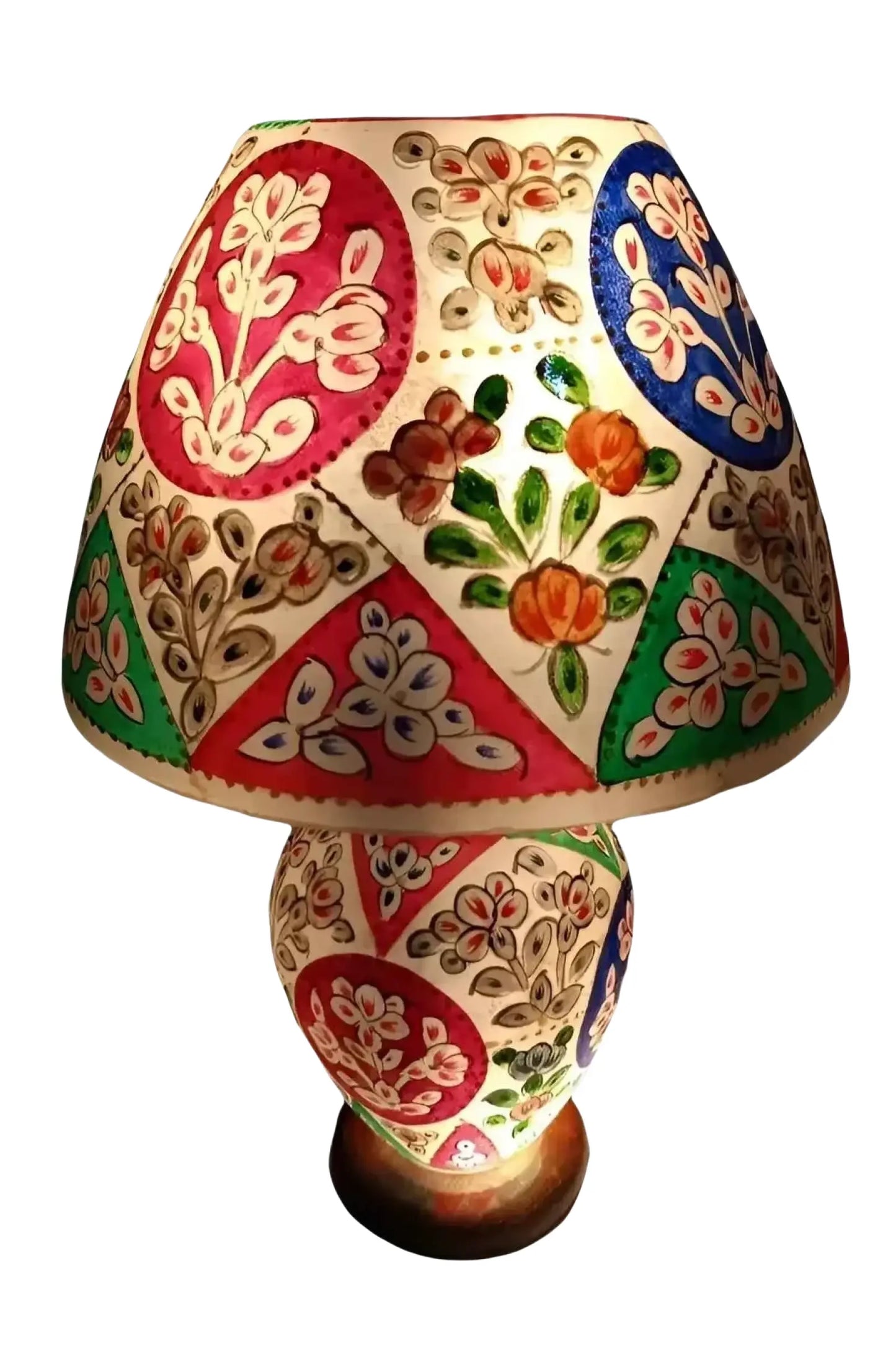 Hand painted ceramic camel skin lamp with vibrant red blue green floral patterns on an off white base for table use